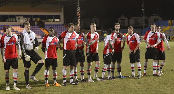 Lining Up: The Woking players get ready for a battling draw at Macclesfield Town (Photo courtesy of David Holmes)