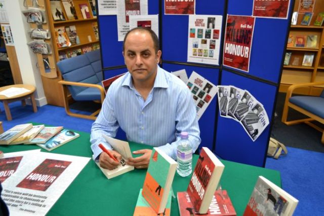 Safe Hands: Bali Rai during an author visit to the John Lyon School in Harrow, Middlesex