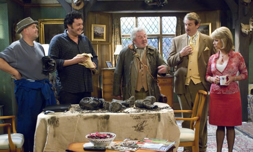 Green Shoot: Boycie (John Challis) and Marlene (Sue Holderness) with d fellow cast members in The Green, Green Grass (Photo: Shazam Productions)