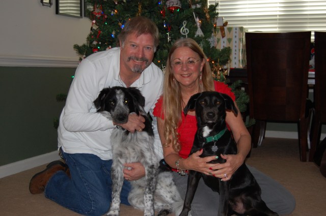 Family Favourites: Judy with her husband Tom. Judy is with Oagie, and Tom is holding Wilson (Photo: Judy Street)