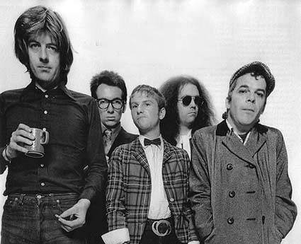 Famous Five: From the left, Nick Lowe, Elvis Costello, Wreckless Eric, Larry Wallis and Ian Dury, presumably  waiting for the 1977 tour bus