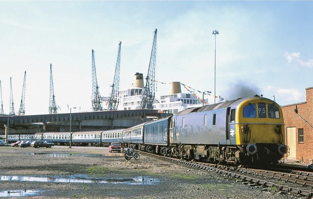 Boat Train: A Class 74 electro-diesel leaves Southampton's old docks bound for Waterloo in May 1975, with the P&O's Oriana in the background (Photo: George Woods)