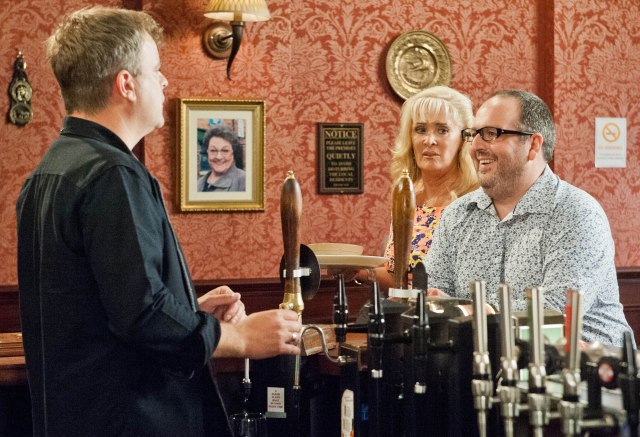Rovers Return: Justin as Dean Upton, at the bar with Liz McDonald (Beverley Callard), talking to Steve McDonald (Simon Gregson) on Coronation Street (Photo: ITV / www.itvpictures.com)
