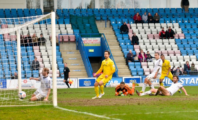 Bucks Stopped: Late scorers Giuseppe Sole and Kevin Betsy look on as the latter's finish beats the Telford keeper (Photo: David Holmes)