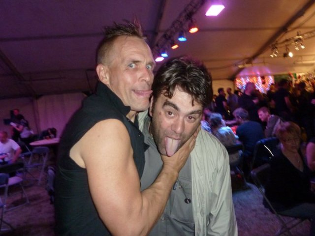 Tongue Tied: A rare shot of Tuff Life Boogie promoter Rico La Rocca, getting friendly with Membranes and Goldblade frontman and Louder than Bombs founder John Robb (Photo: Rico La Rocca)