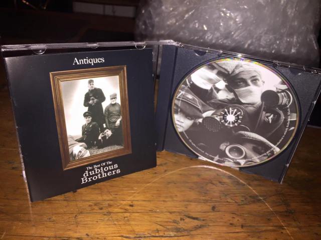 Valuable Antiques: The Dubious Brothers, on the cover of the newly-repackaged Antiques compilation
