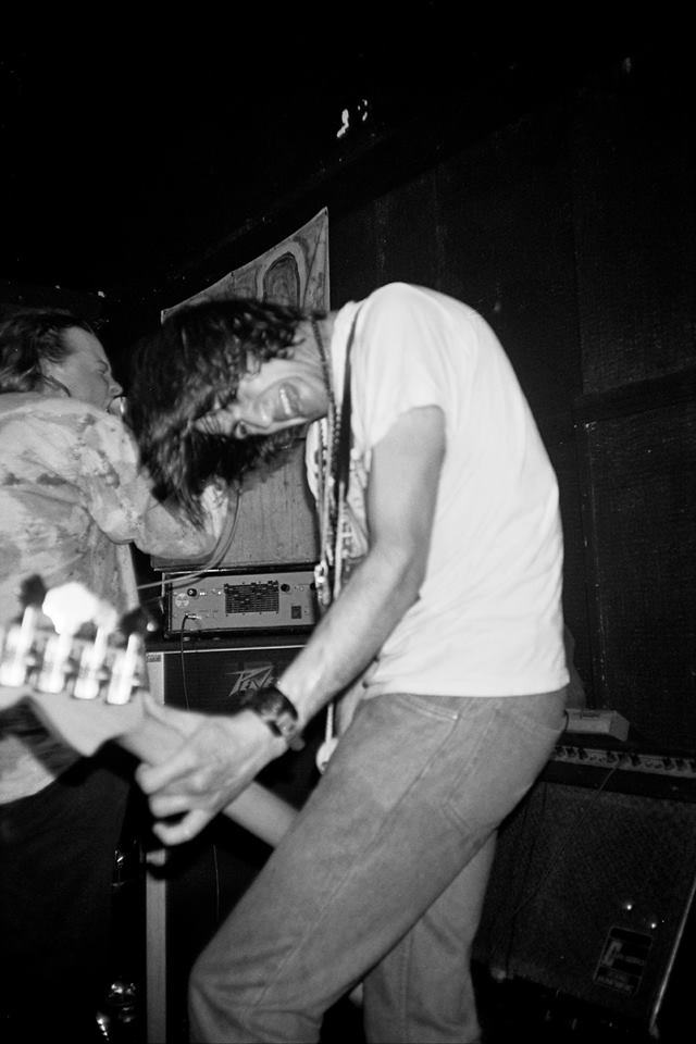 Low-slung Bass: Ajay Saggar wigs out at the Lady Owen Arms with Dandelion Adventure in 1990 (Photo: Greg Neate)