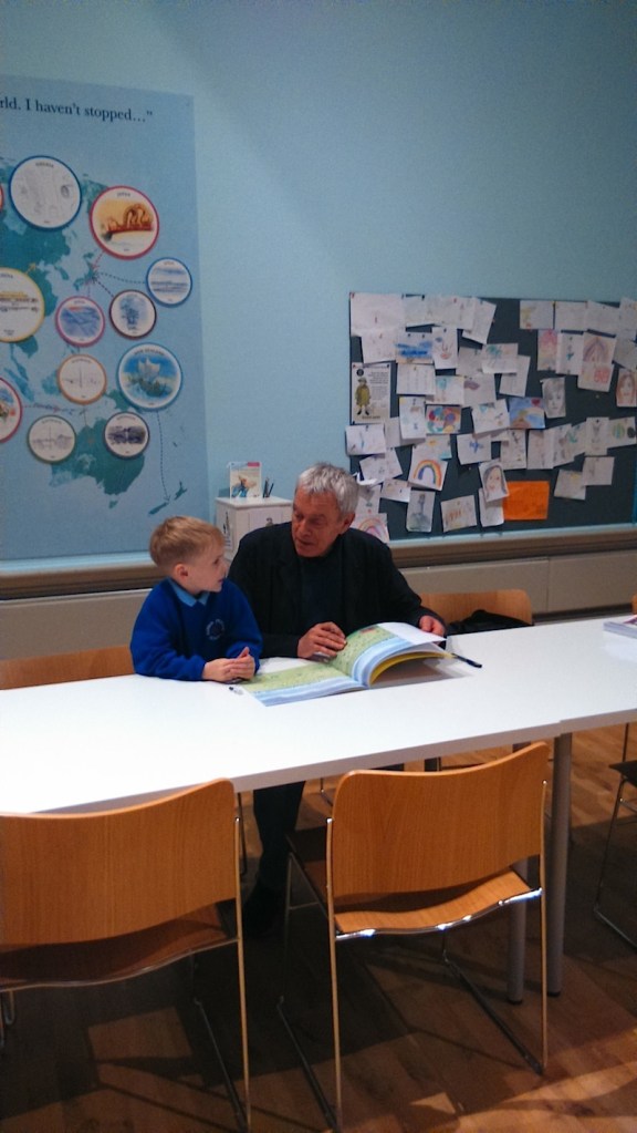 Learning Curve: Michael with a young fan and competition winner at the Harris Museum & Gallery, Preston (Photo: Joan Fussell)