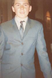 Sharp Suited: A young Den Davis, out on the town